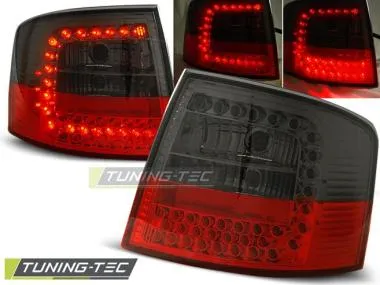 Stopuri rosu fumurii pentru Audi A6 05.1997-05.2004. Tuning-Tec - LDAU52